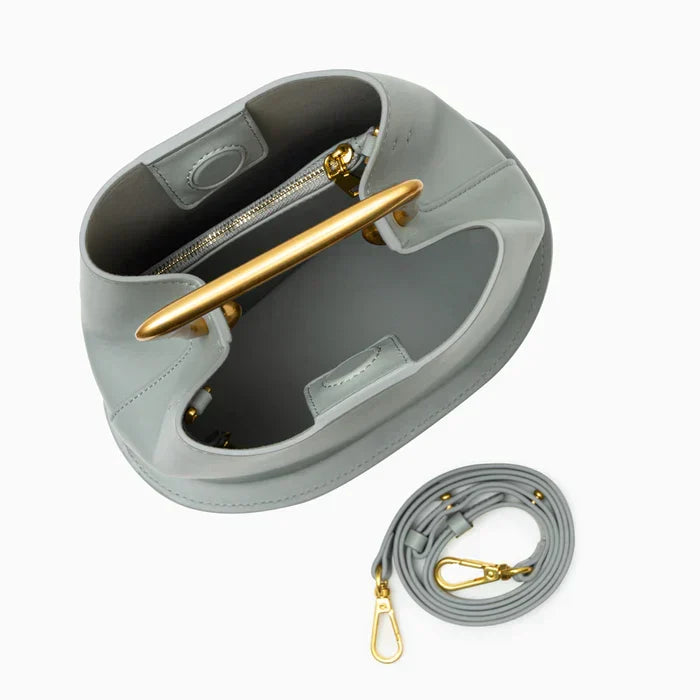 Bolso bucket minimalista con asa dorada — modelo Soralla (imagen 11)